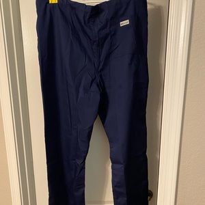 Uniform Advantage navy blue scrubs, size M.